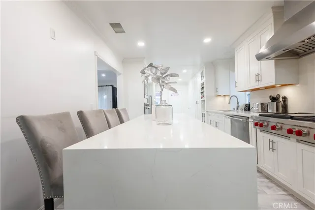 a kitchen with a sink and a window