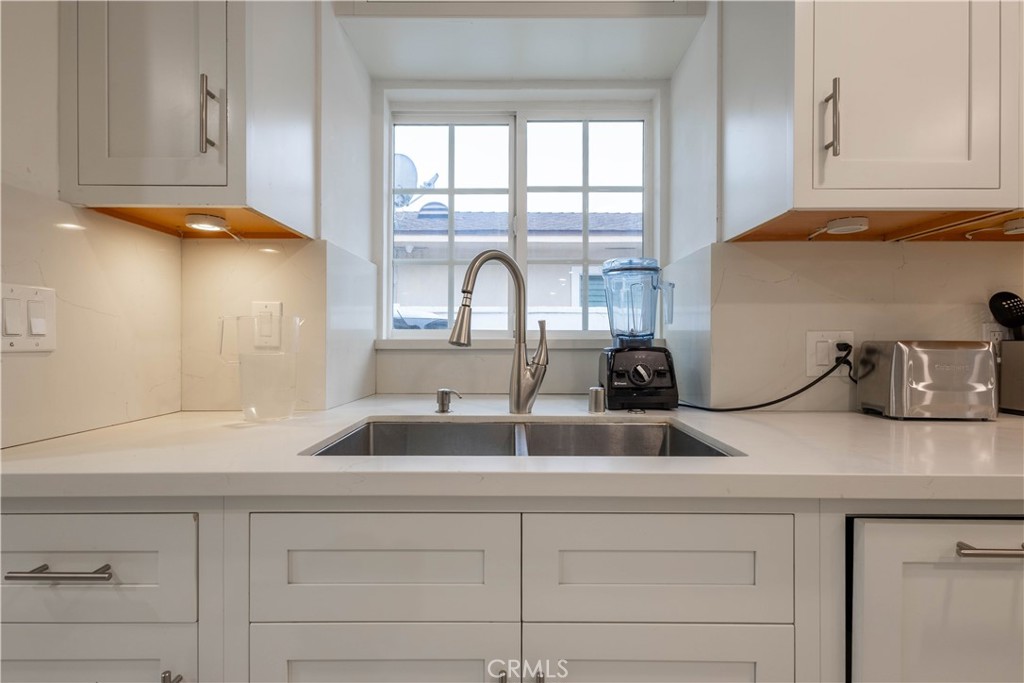 7847 Brookmill Road Downey, CA 90241 - Photo 19 of 71 a kitchen with a sink and a window