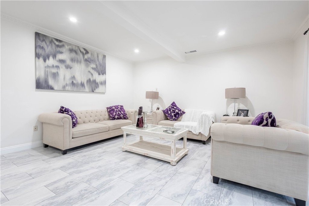 7847 Brookmill Road Downey, CA 90241 - Photo 27 of 71 a bedroom with furniture and a couch