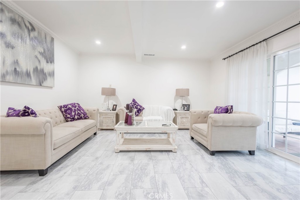 7847 Brookmill Road Downey, CA 90241 - Photo 28 of 71 a living room with furniture and a couch