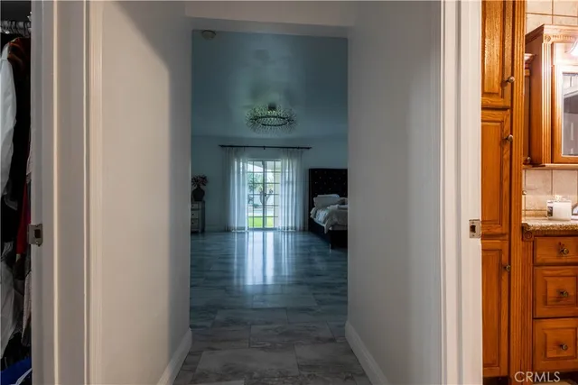 a view of a livingroom with furniture and a fireplace