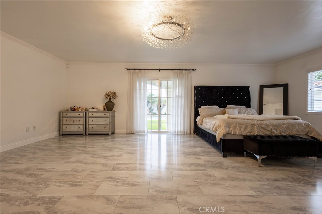 7847 Brookmill Road Downey, CA 90241 - Photo 52 of 71 a bedroom with a bed and window