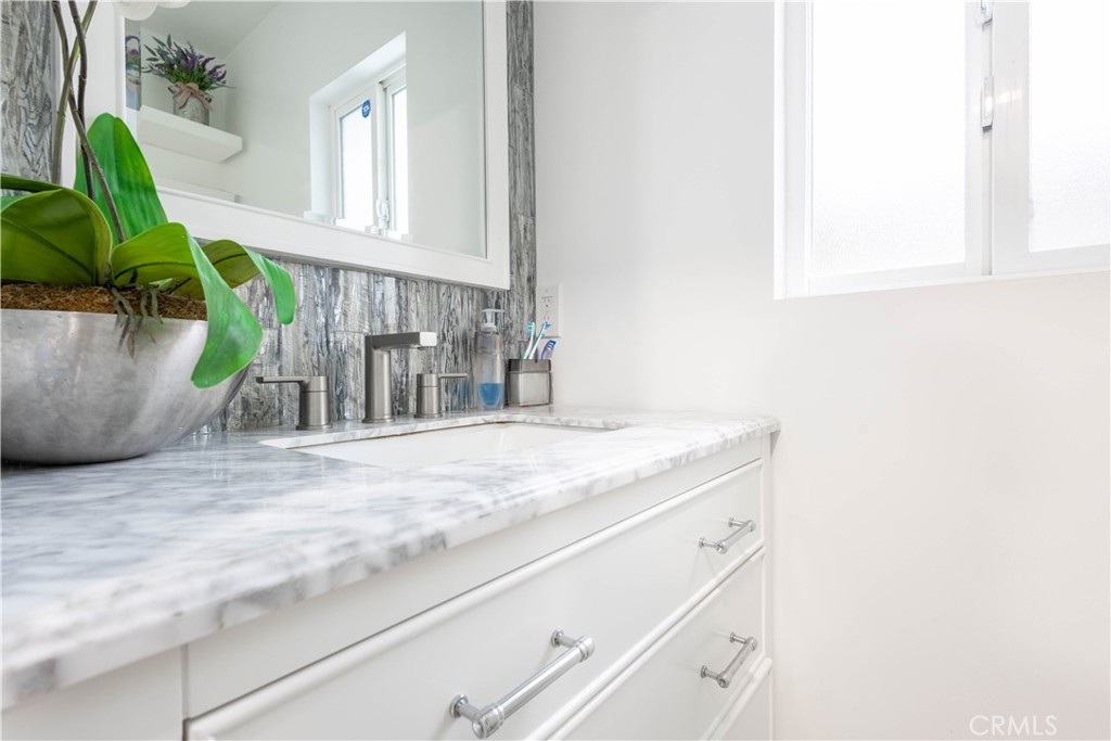 7847 Brookmill Road Downey, CA 90241 - Photo 58 of 71 a utility room with a sink