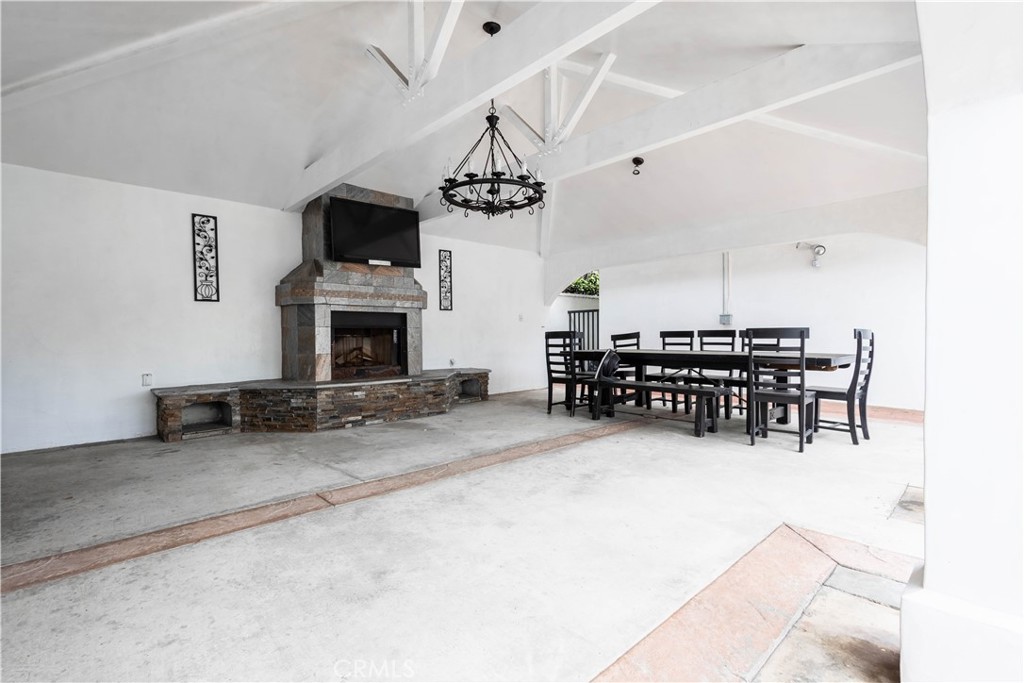 7847 Brookmill Road Downey, CA 90241 - Photo 63 of 71 a view of a livingroom with furniture and a fireplace