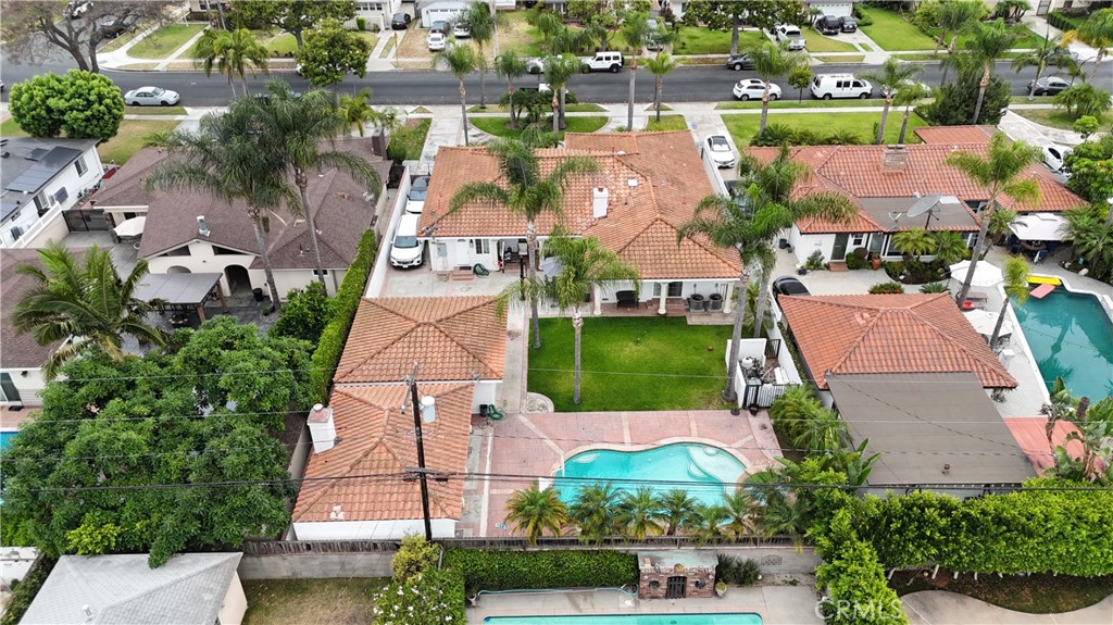 7847 Brookmill Road Downey, CA 90241 - Photo 69 of 71 an aerial view of residential houses with outdoor space