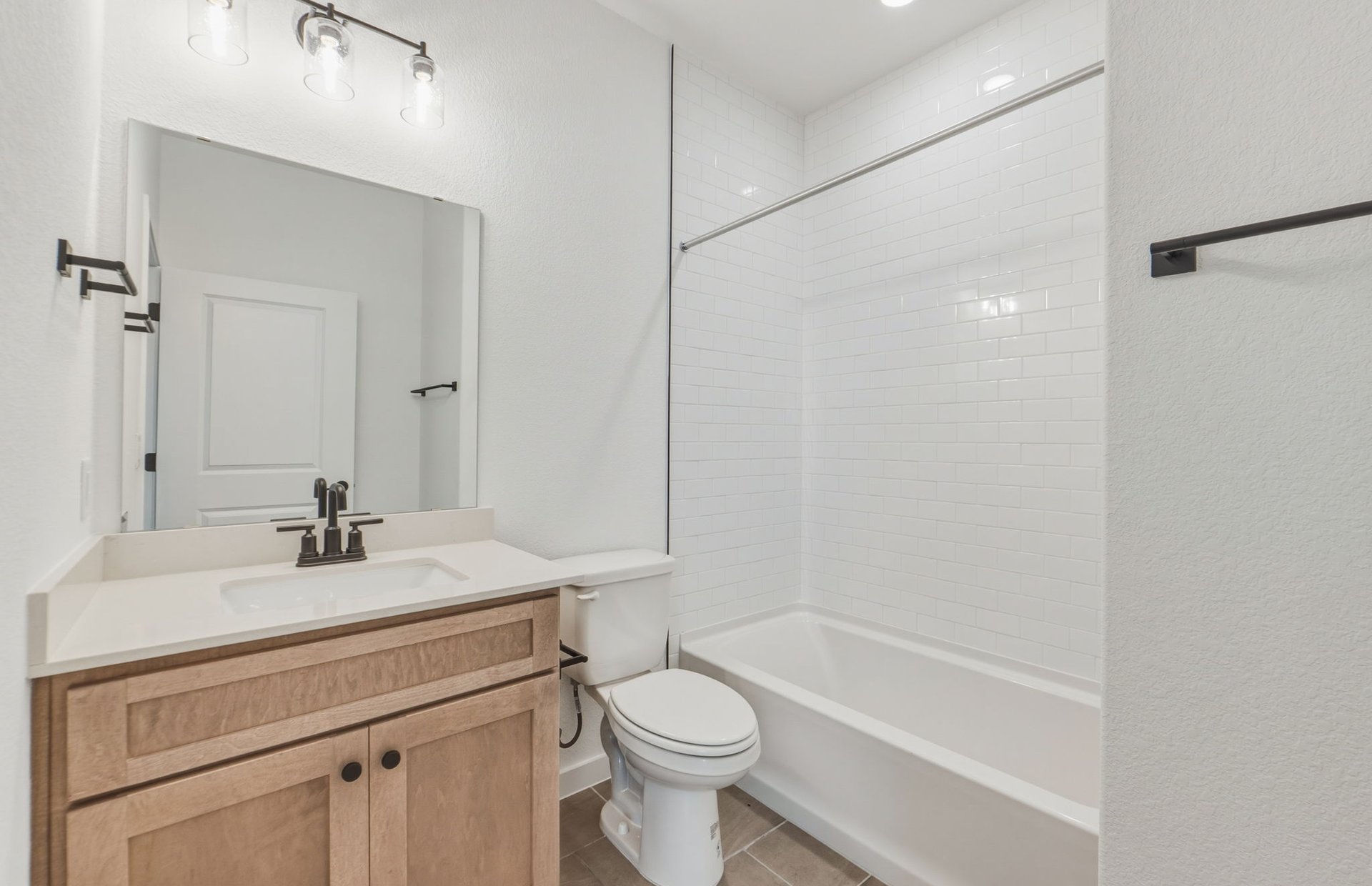 207 Smokestack Lane Georgetown, TX 78633 - Photo 14 of 21 a bathroom with a sink a toilet and shower