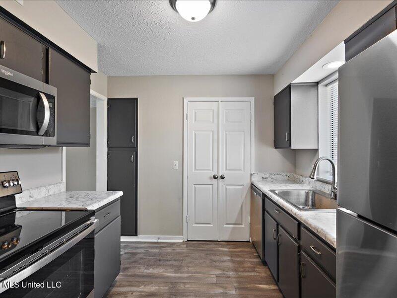 1255 East County Line Road, Unit K4 Jackson, MS 39211 - Photo 5 of 11 IMG_1590
