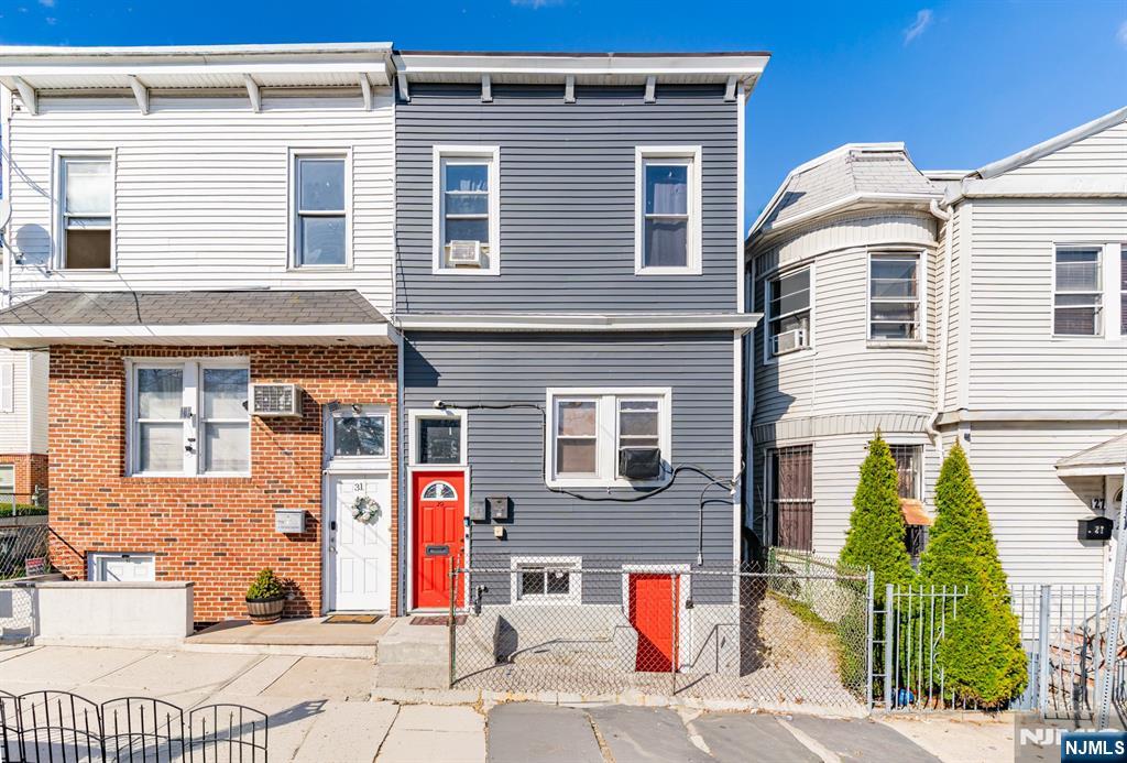 29 6th Avenue Newark, NJ 07104 - Photo 1 of 21 a front view of a house
