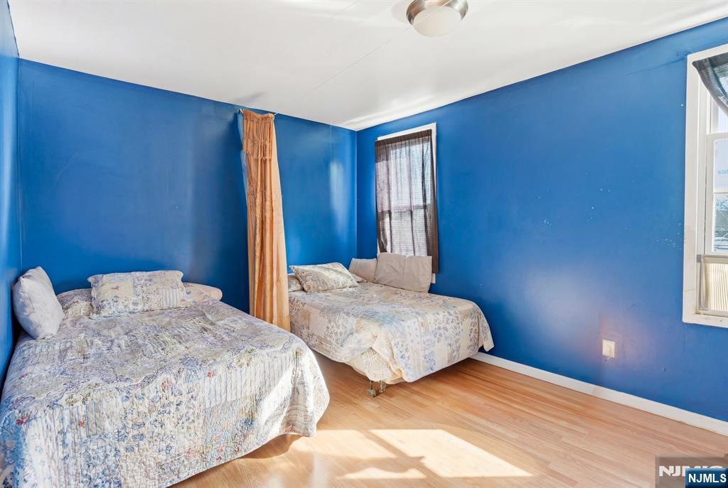 29 6th Avenue Newark, NJ 07104 - Photo 16 of 21 a bedroom with bed and window