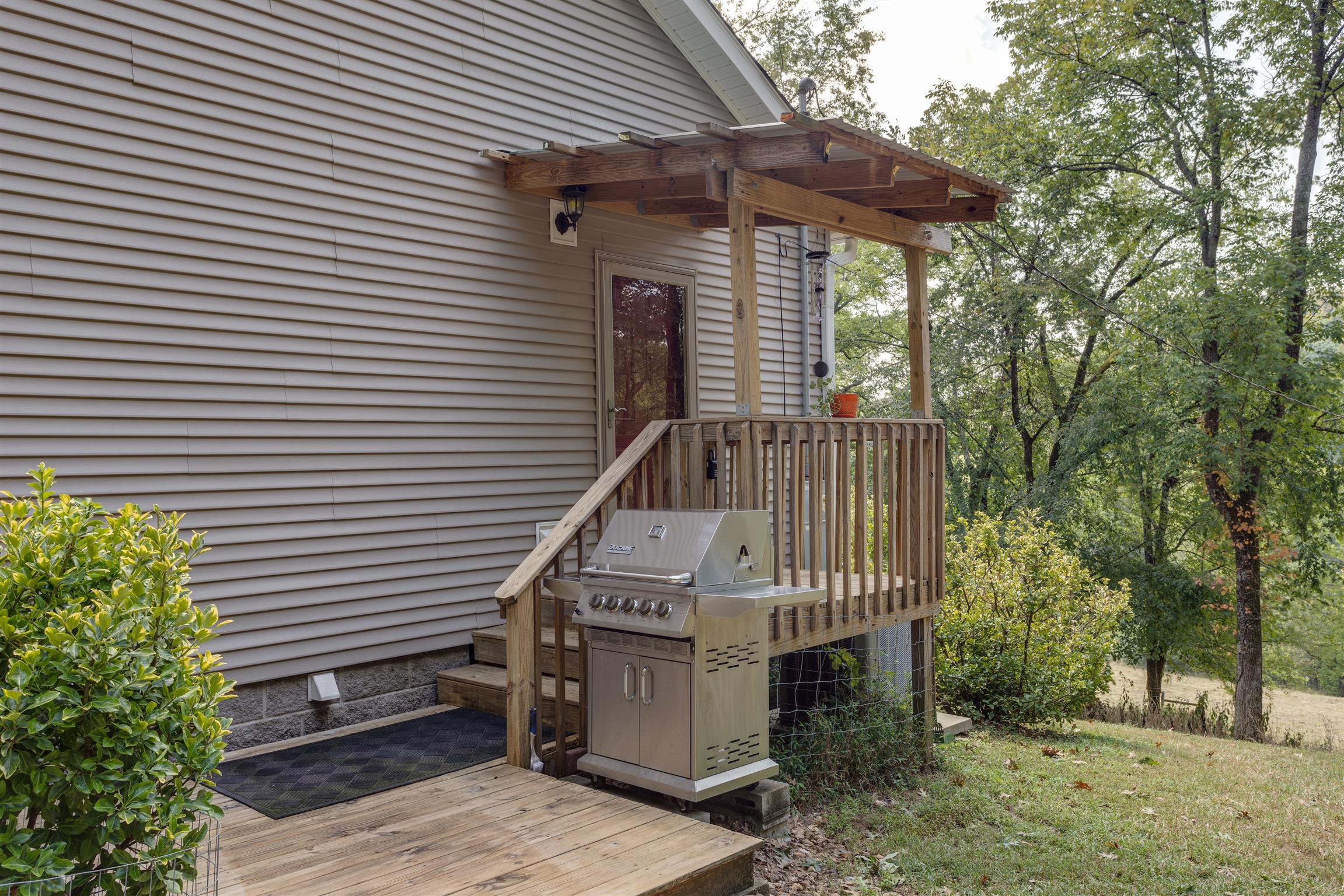 3675 Ball Hollow Road Pulaski, TN 38478 - Photo 19 of 28 Side Entry - Park in the Double Carport and take level steps to the side door. Gas Grill Negotiable.