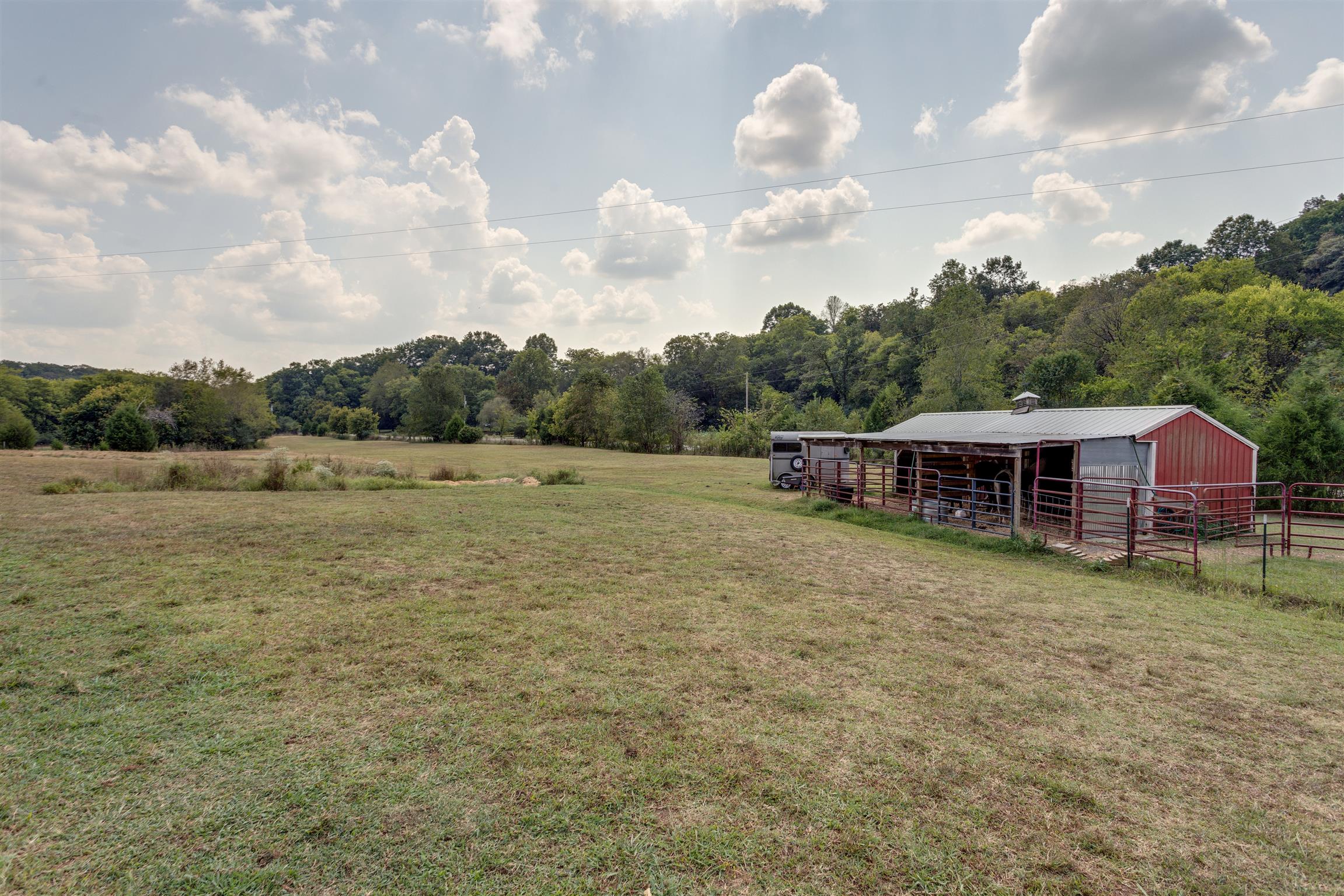 3675 Ball Hollow Road Pulaski, TN 38478 - Photo 22 of 28 Barn has water and storage room. Great for Horses or ATV toys to ride around property/woods.
