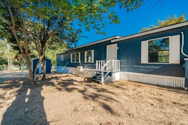 a view of a house with a patio
