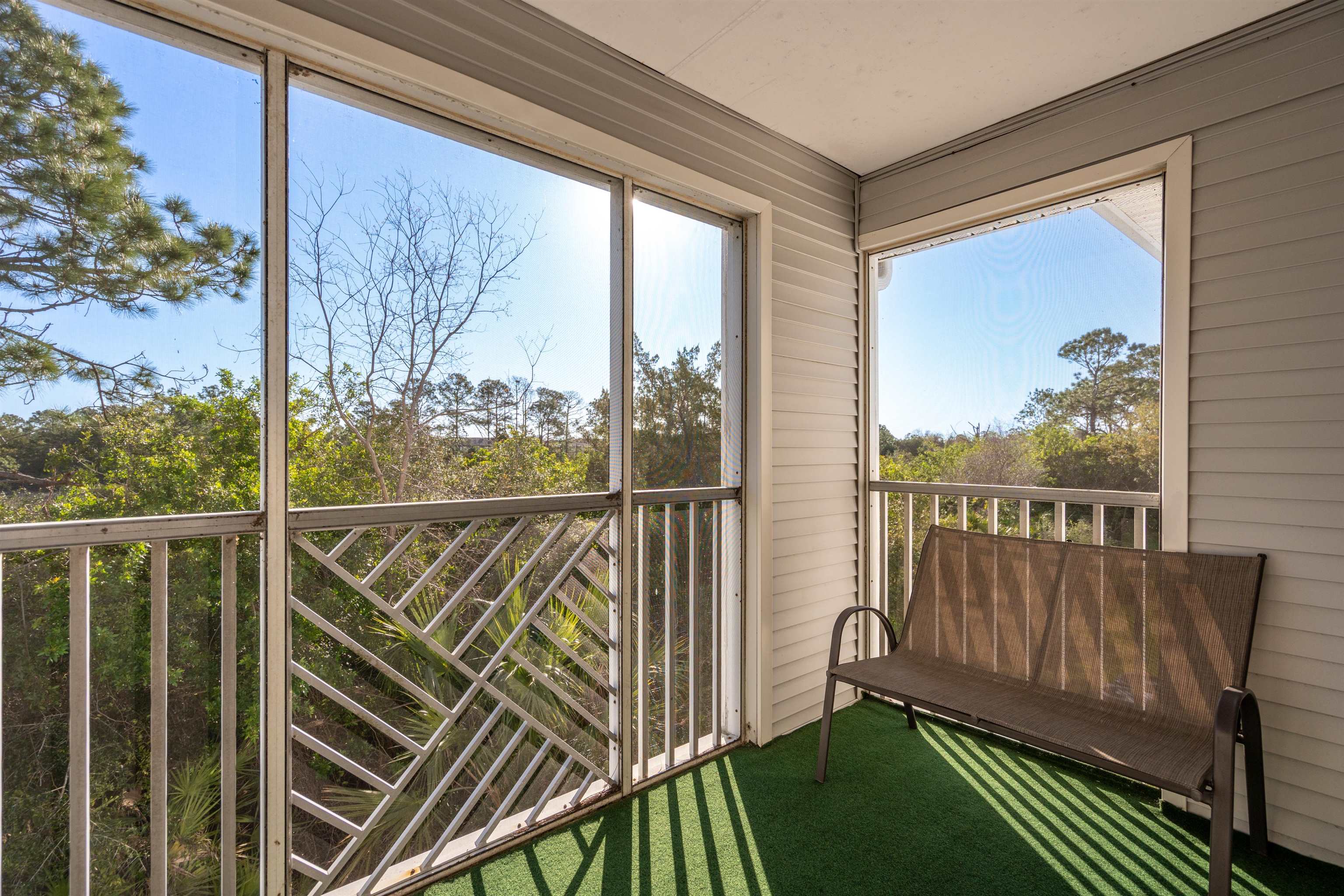 11207 Harbour Vista Circle, Unit 11207 St. Augustine, FL 32080 - Photo 20 of 42 a view of a balcony with wooden floor