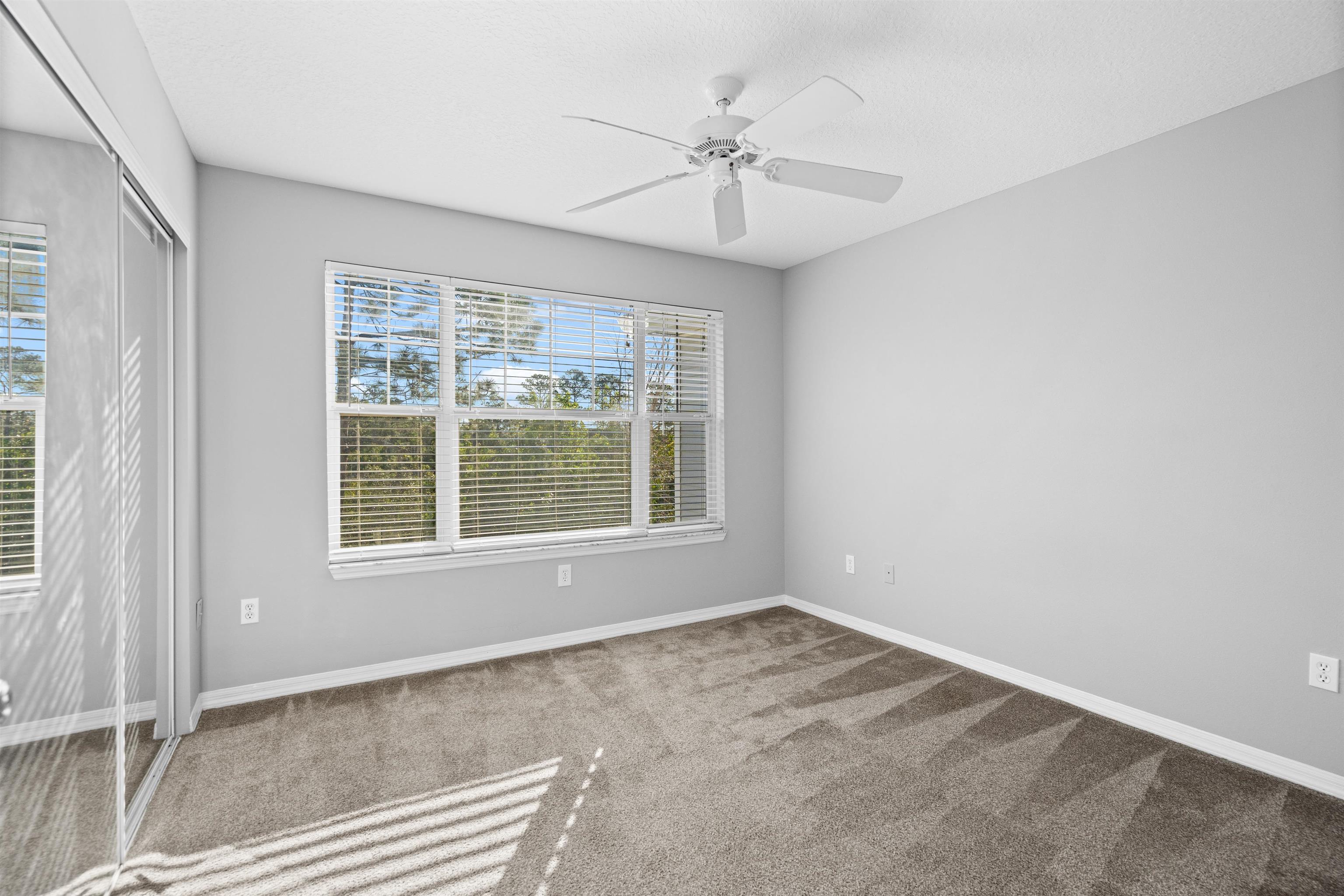 11207 Harbour Vista Circle, Unit 11207 St. Augustine, FL 32080 - Photo 21 of 42 an empty room with a window