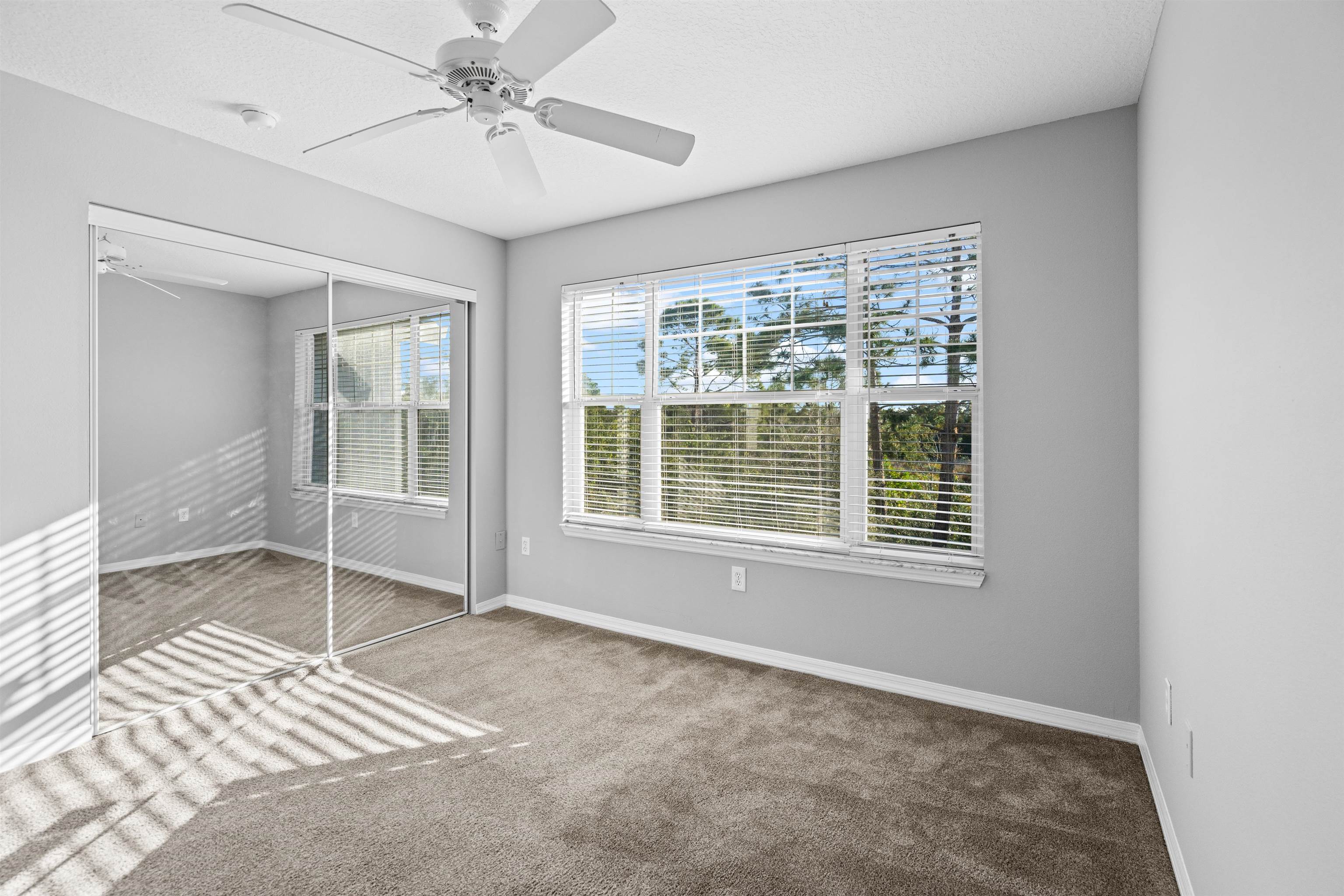 11207 Harbour Vista Circle, Unit 11207 St. Augustine, FL 32080 - Photo 22 of 42 a view of an empty room with a window