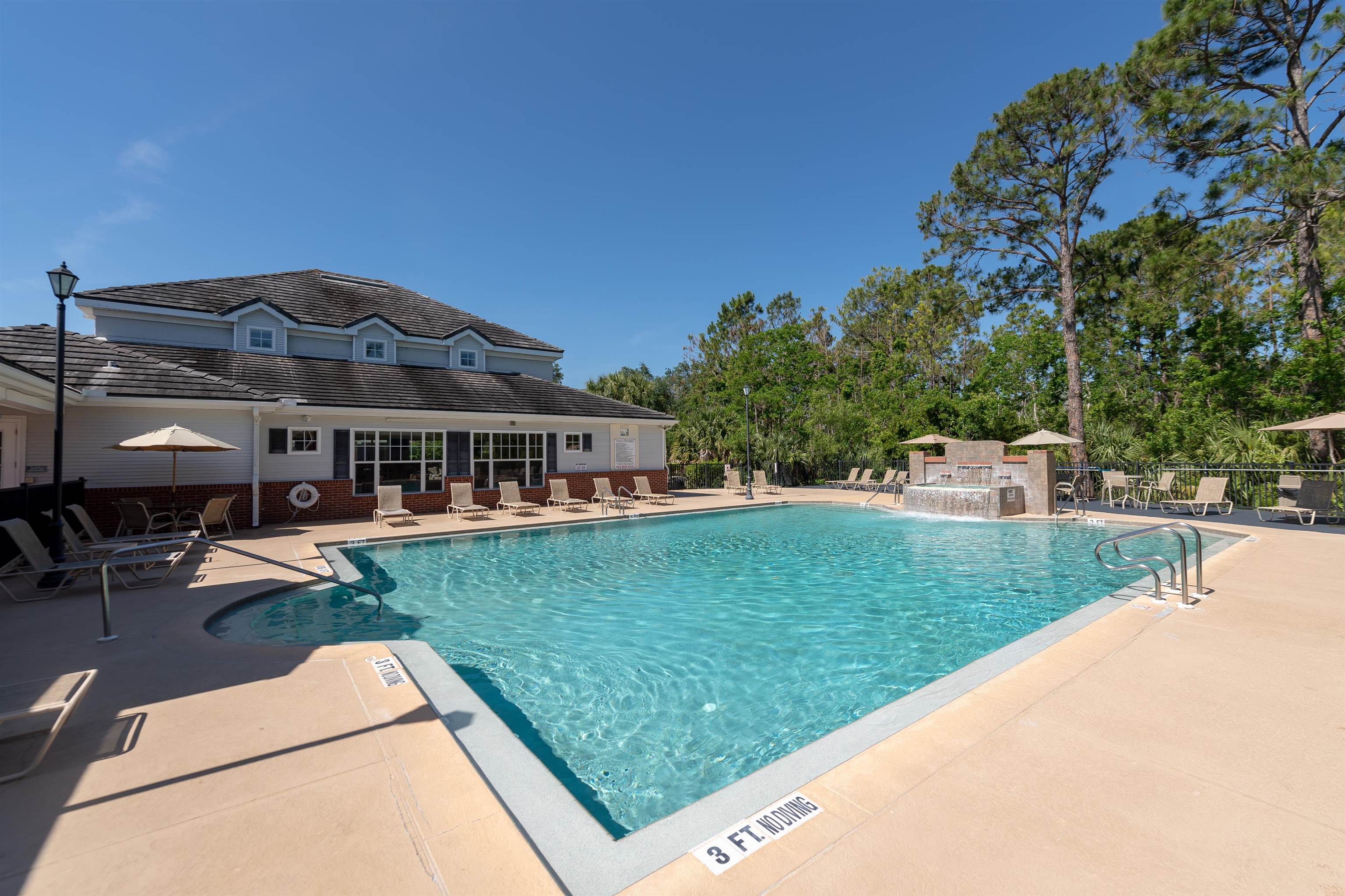 11207 Harbour Vista Circle, Unit 11207 St. Augustine, FL 32080 - Photo 32 of 42 a view of a house with a yard