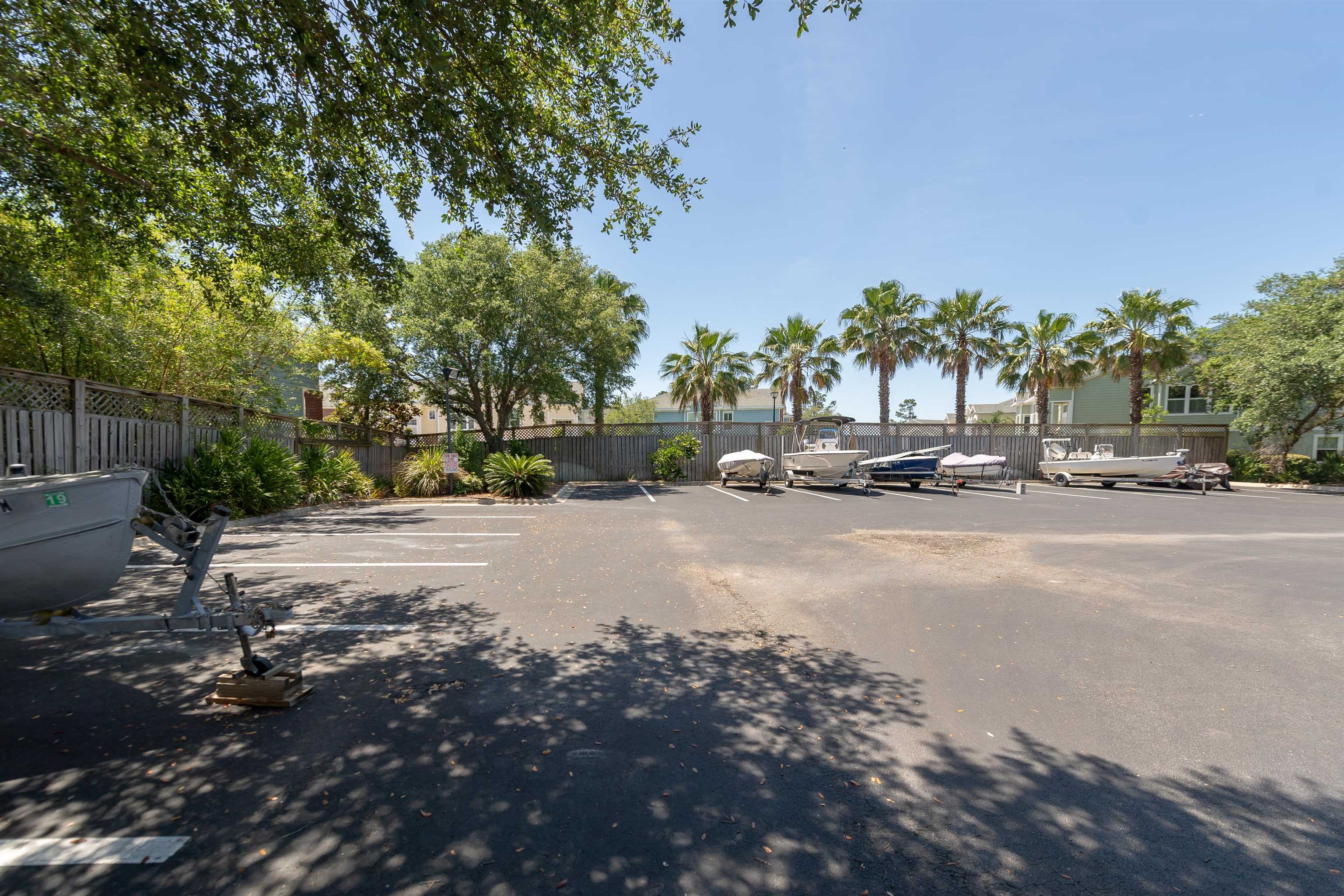 11207 Harbour Vista Circle, Unit 11207 St. Augustine, FL 32080 - Photo 40 of 42 a view of road with a building and trees around