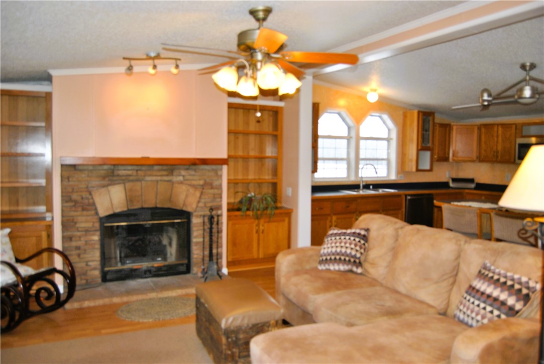 7200 Adams Road Livonia, NY 14466 - Photo 5 of 17 Living room with Wood Fireplace