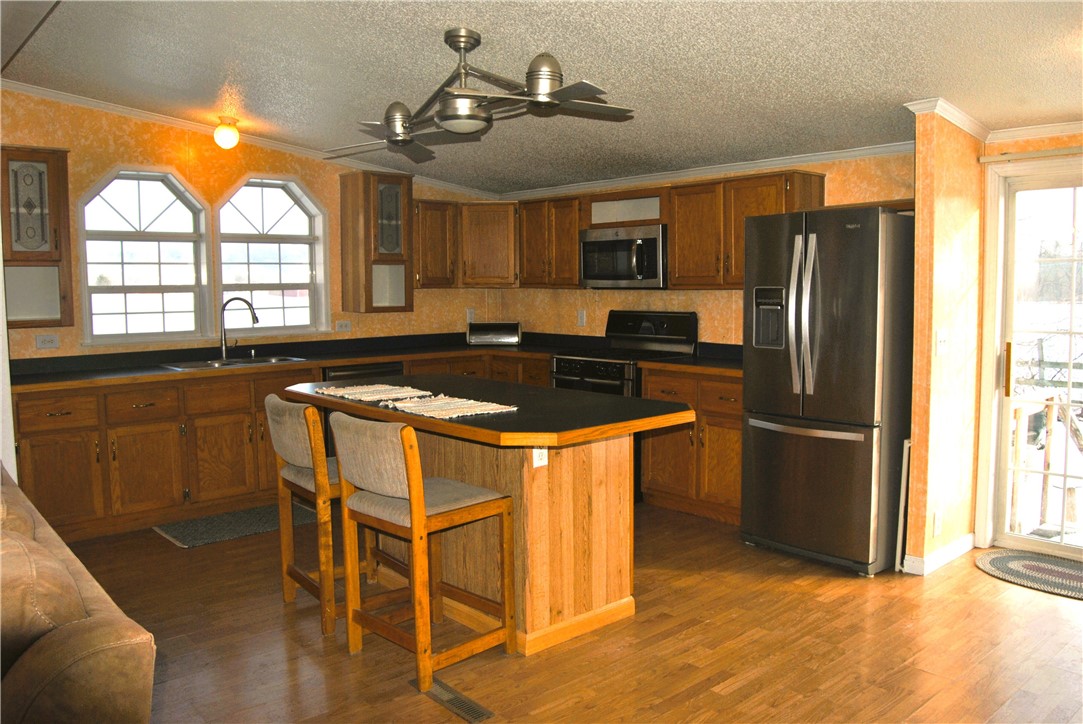 7200 Adams Road Livonia, NY 14466 - Photo 6 of 17 Kitchen Island