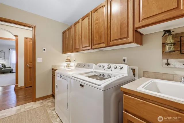 a utility room with dryer and washer