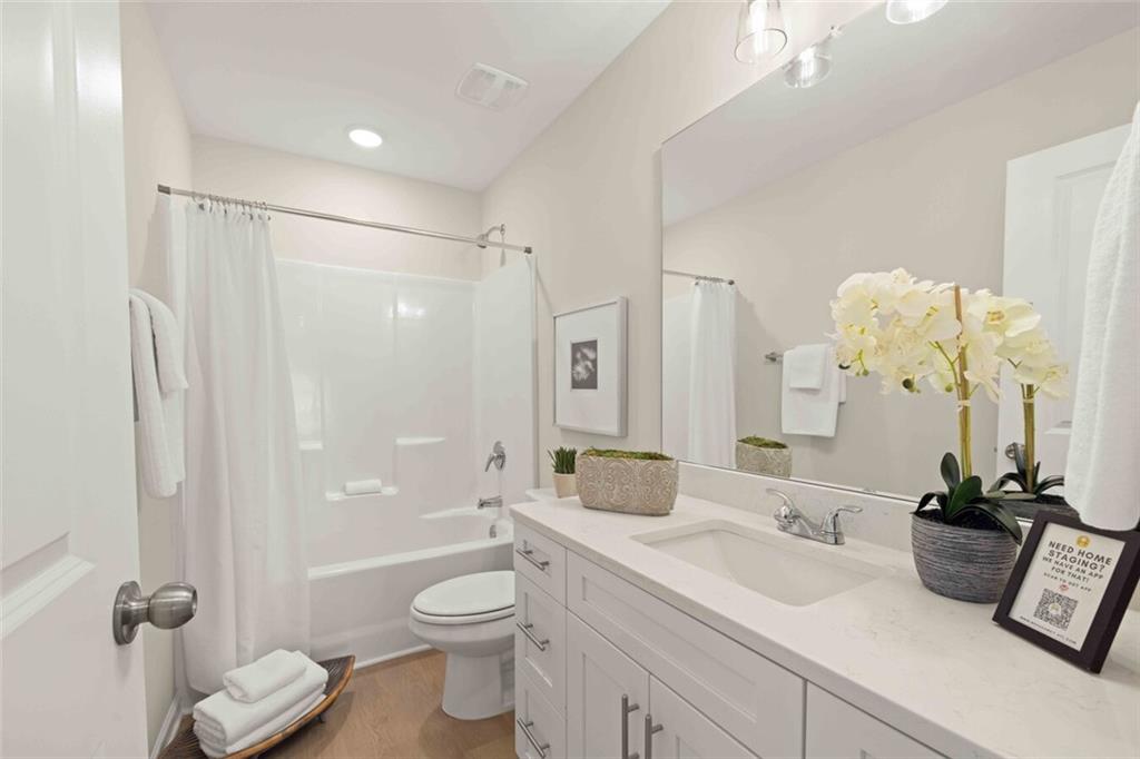 3489 Fairview Road, Unit MAGNOLIA Covington, GA 30016 - Photo 28 of 29 a bathroom with a sink a toilet and shower