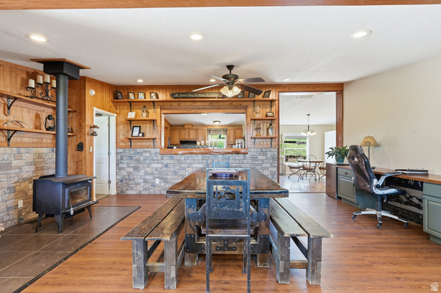 8066 North Valley View Heights Preston, ID 83263 - Photo 10 of 34 Open-concept living space with wood-finish flooring and recessed lighting