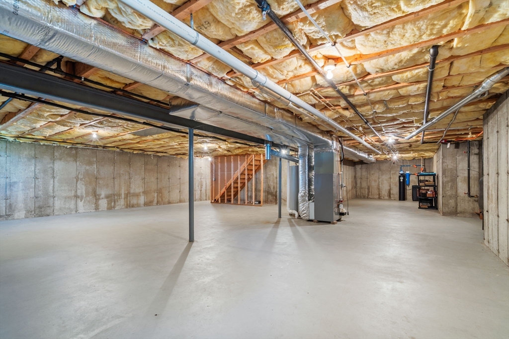 11 Pondside Lane, Unit 11 Bolton, MA 01740 - Photo 23 of 29 a view of empty room with wooden ceiling