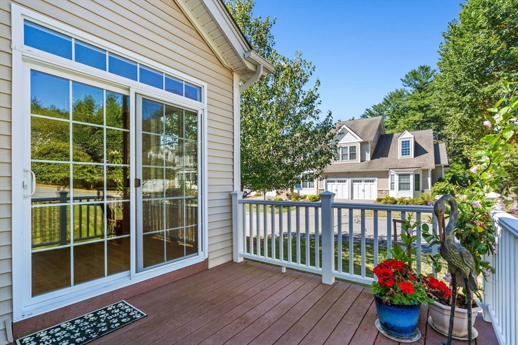 11 Pondside Lane, Unit 11 Bolton, MA 01740 - Photo 26 of 29 a view of a house with a porch