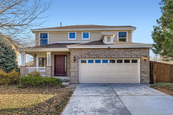 a front view of house with yard