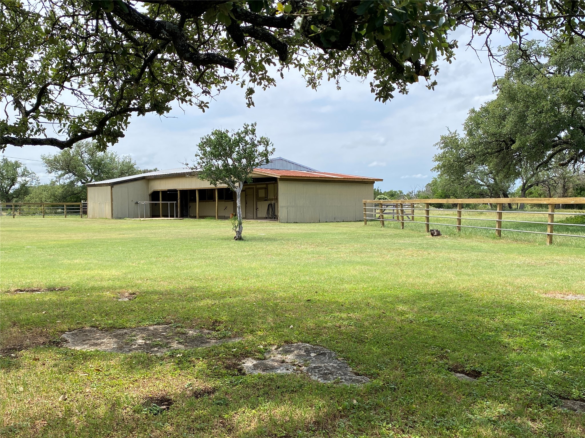 140 Oak Ridge Road Georgetown, TX 78628 - Photo 16 of 39 View of yard featuring an outbuilding and a pole building