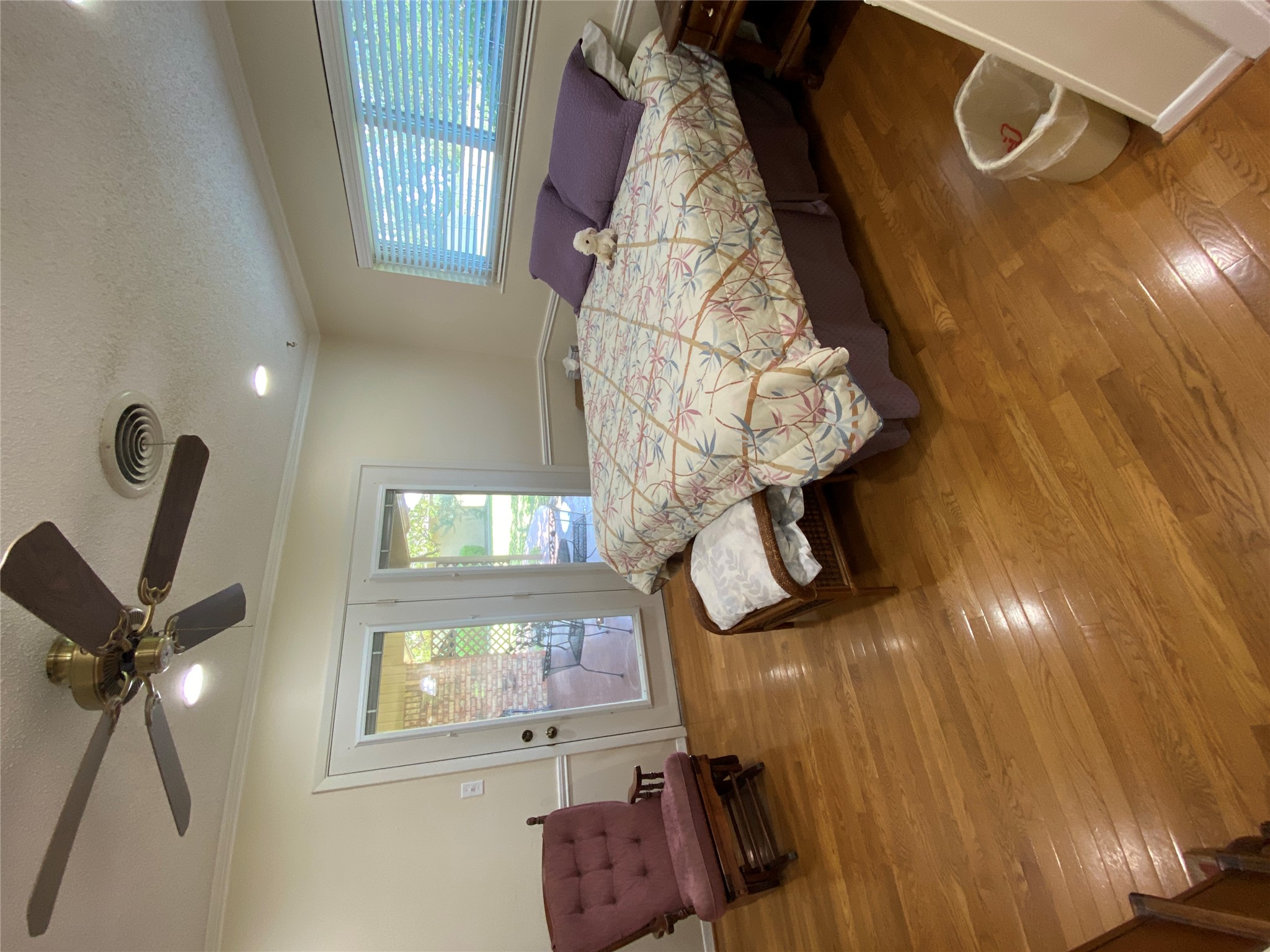 140 Oak Ridge Road Georgetown, TX 78628 - Photo 32 of 39 Bedroom featuring dark wood-style floors, a ceiling fan, access to exterior, recessed lighting, and a textured ceiling