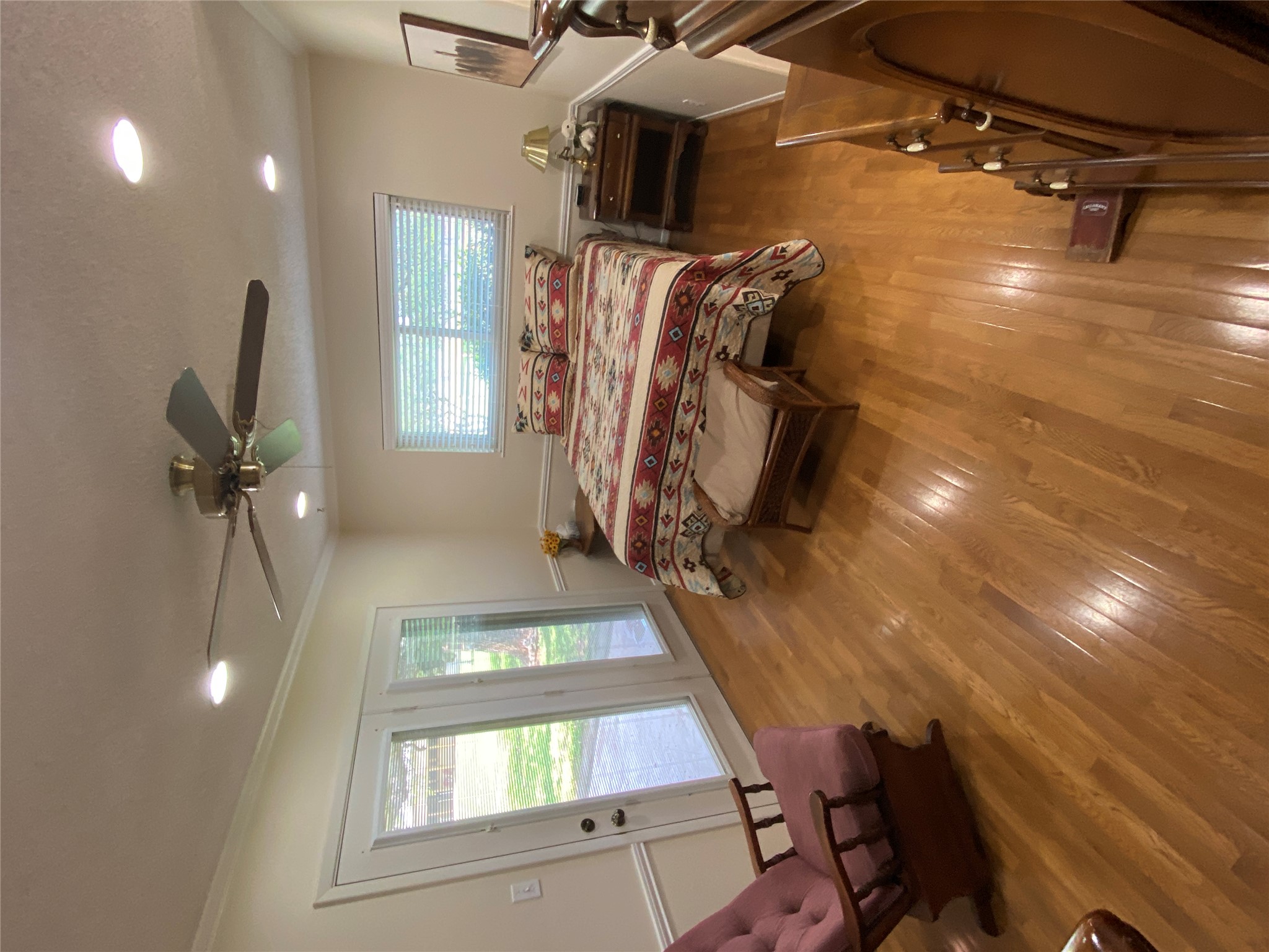 140 Oak Ridge Road Georgetown, TX 78628 - Photo 33 of 40 Hardwood flooring complemented by crown molding and recessed lighting