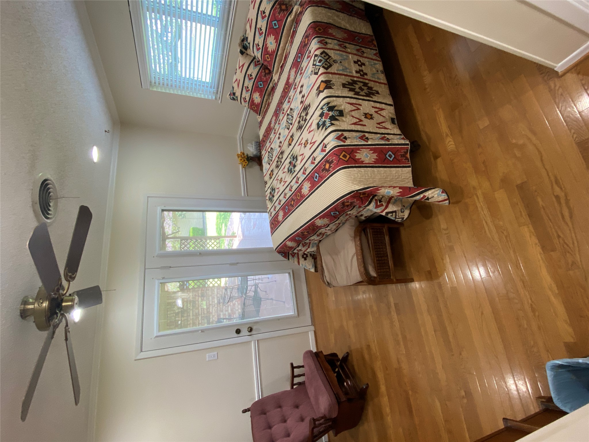 140 Oak Ridge Road Georgetown, TX 78628 - Photo 34 of 40 Solid wood flooring throughout a room featuring a ceiling fan with integrated lighting, recessed lighting, and crown molding