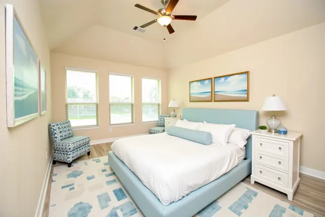 a living room with furniture flower pot and a fireplace