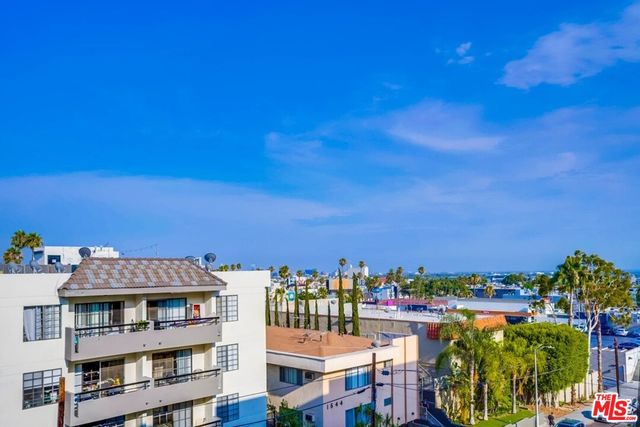a view of a city with tall buildings