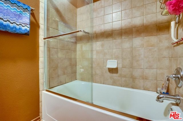 a bathroom with a sink and a bathtub