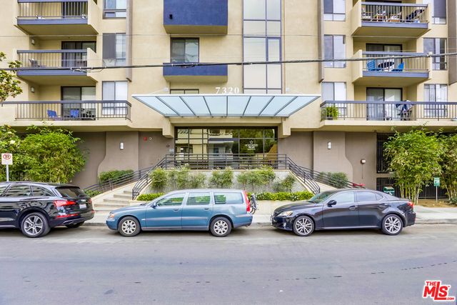 a car parked in front of a building