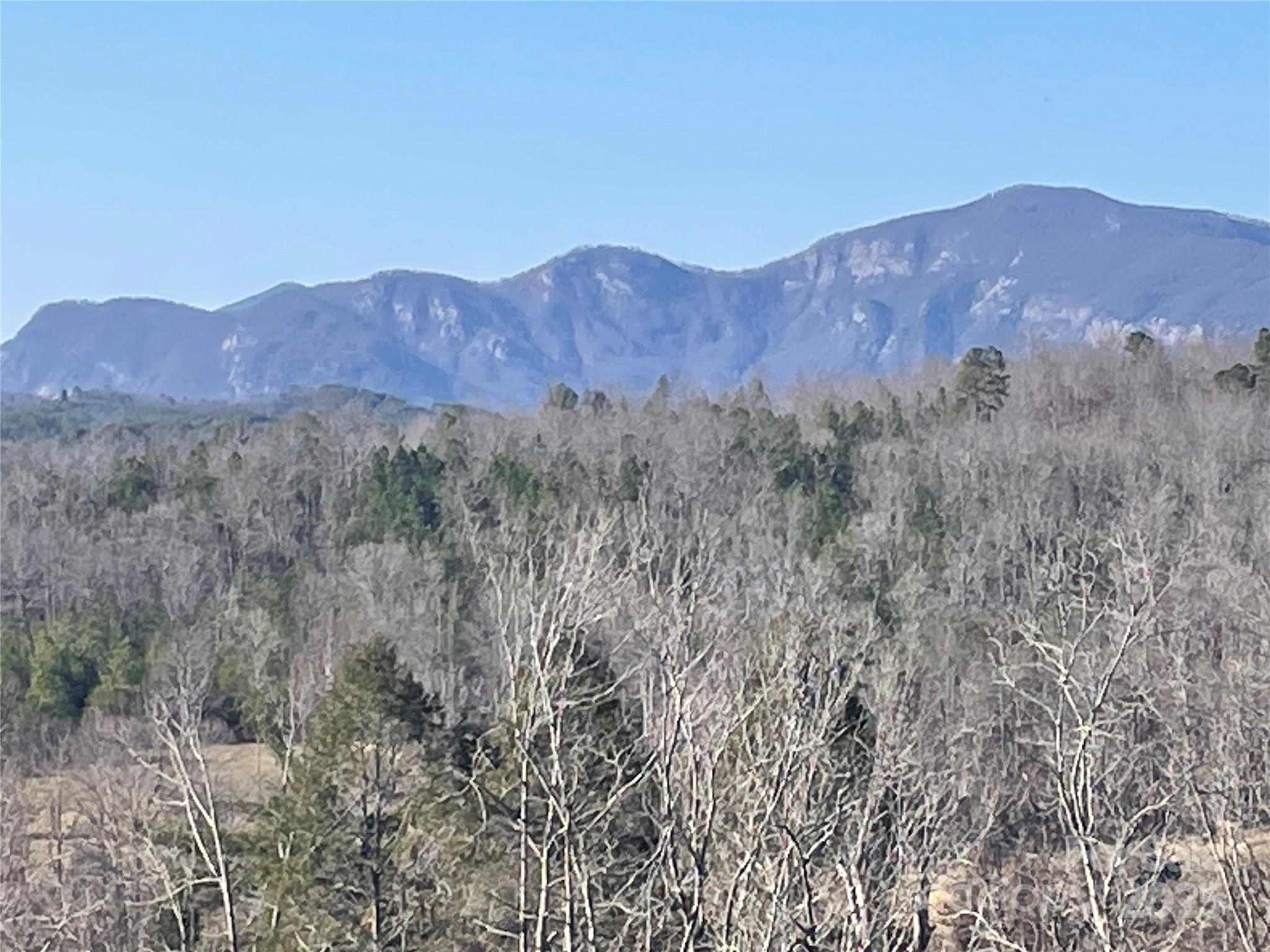 Tbd South Cross Crk Trail Mill Spring, NC 28756 - Photo 1 of 9 a view of mountains and valleys in the distance