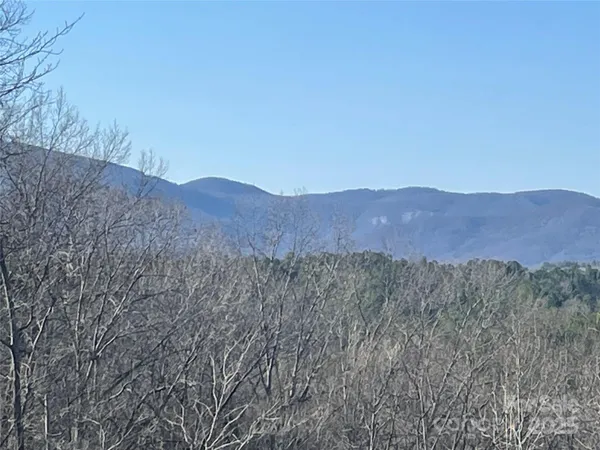 a view of mountains and valleys