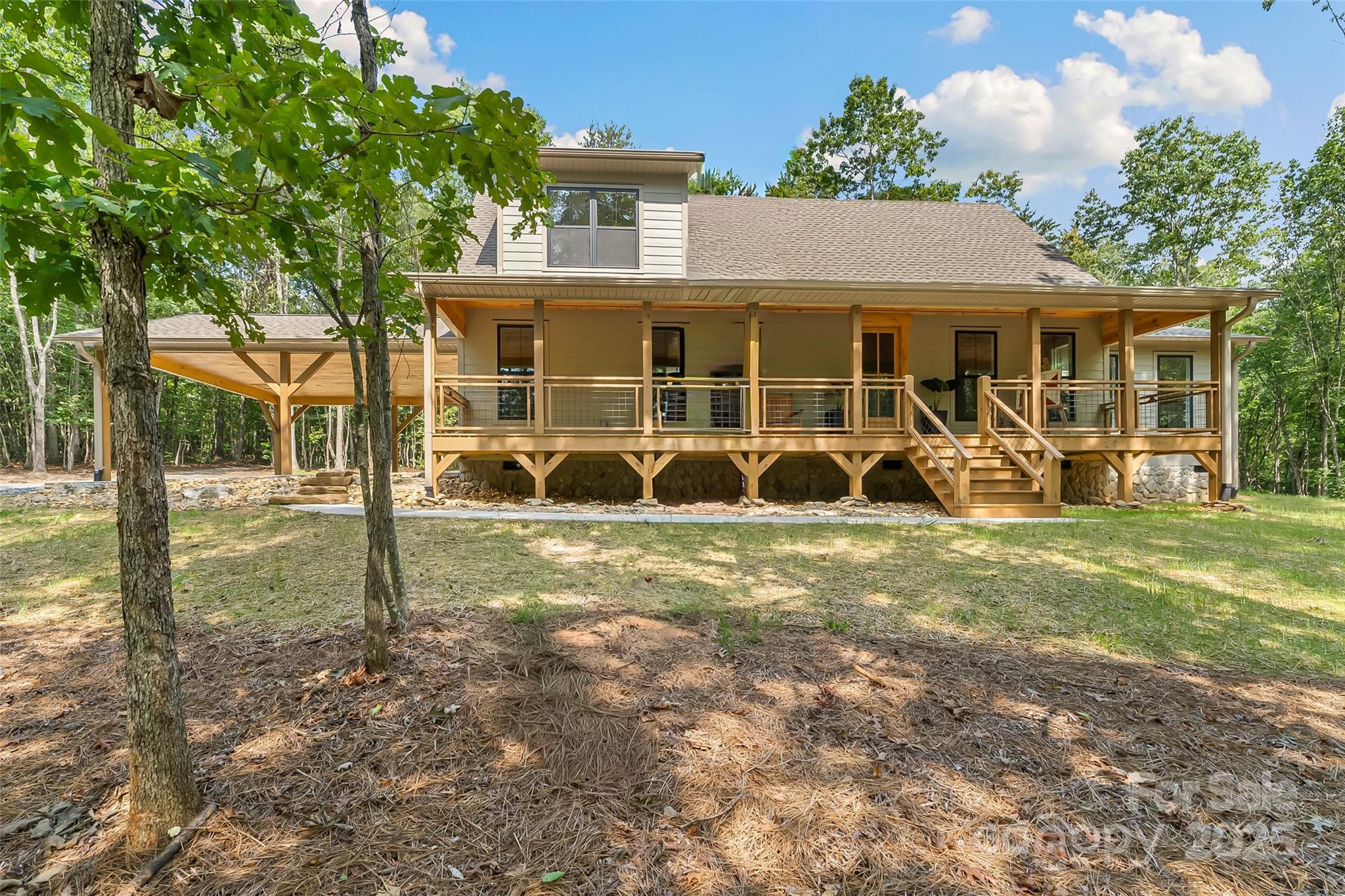 5251 Mt Olive Church Road Morganton, NC 28655 - Photo 1 of 43 a view of a house with a yard and sitting area