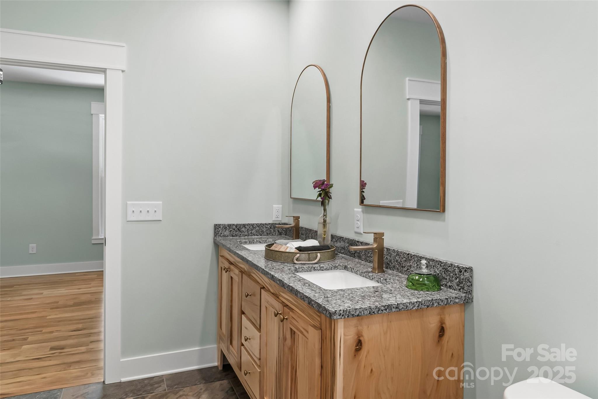 5251 Mt Olive Church Road Morganton, NC 28655 - Photo 19 of 43 a bathroom with a granite countertop sink and a mirror