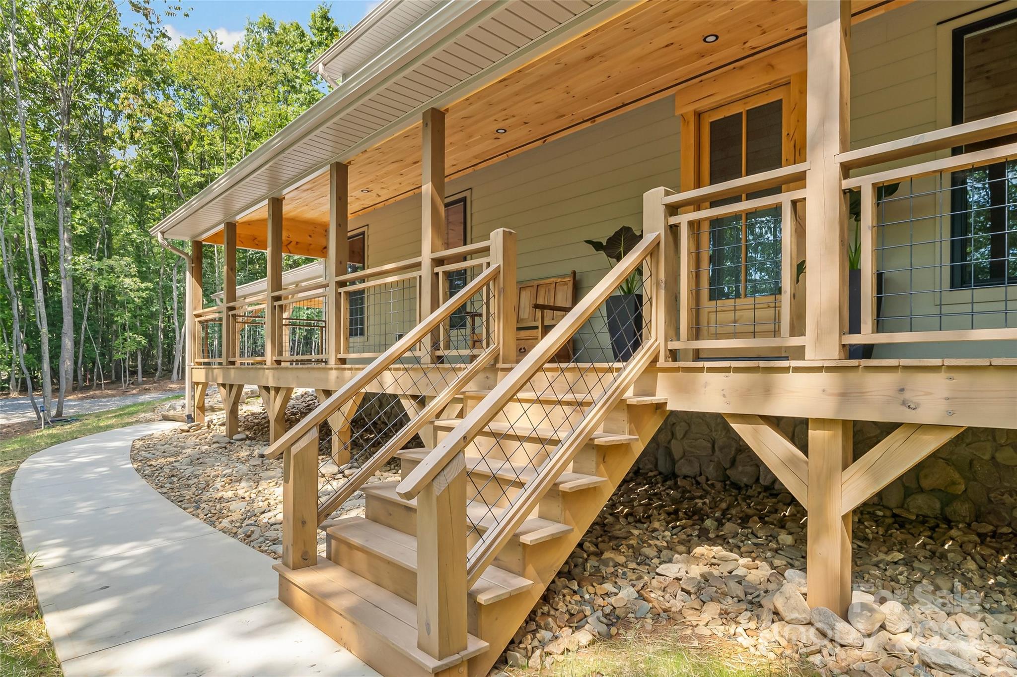 5251 Mt Olive Church Road Morganton, NC 28655 - Photo 2 of 43 a view of a house with large windows