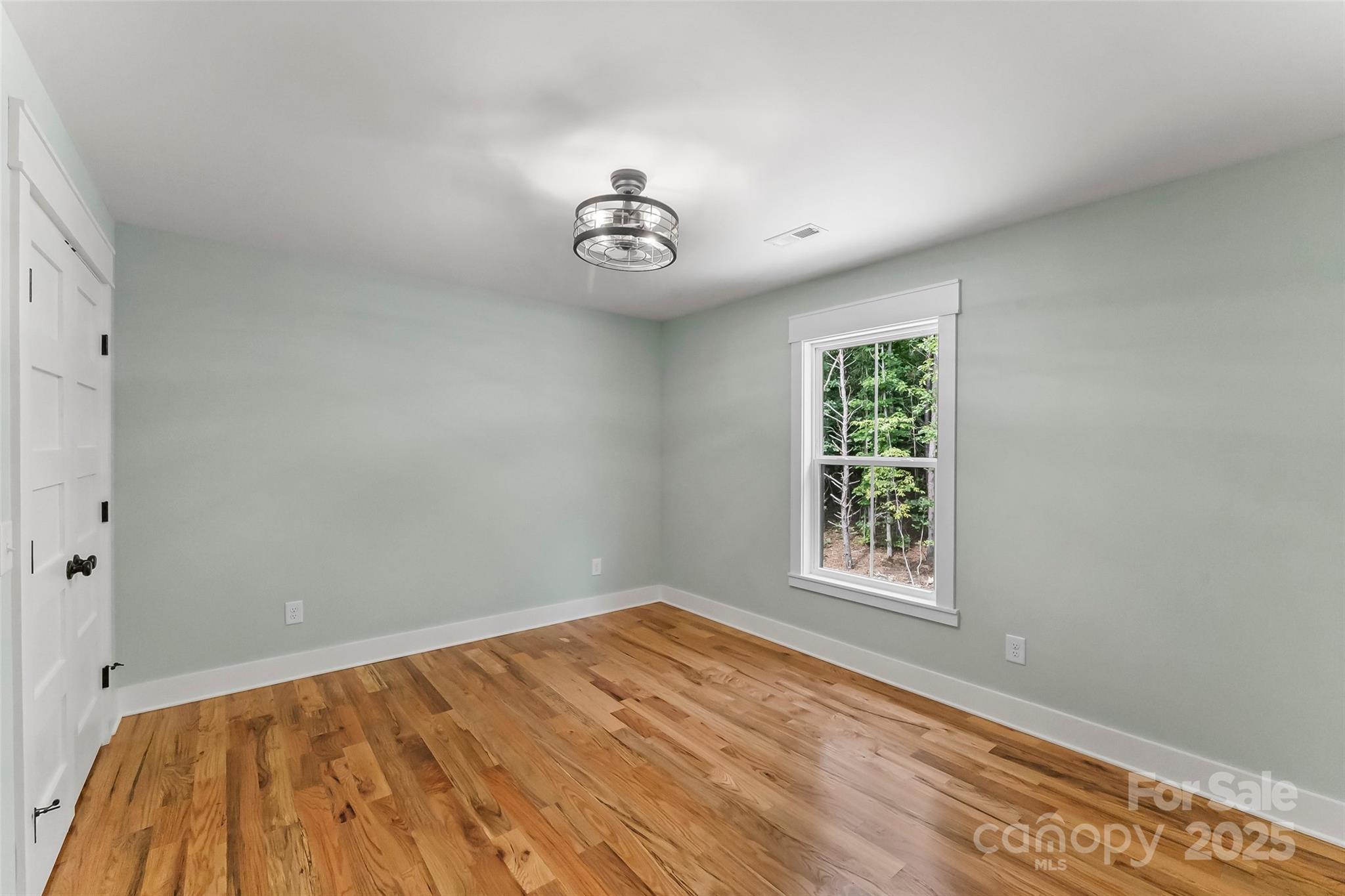 5251 Mt Olive Church Road Morganton, NC 28655 - Photo 33 of 43 an empty room with a window