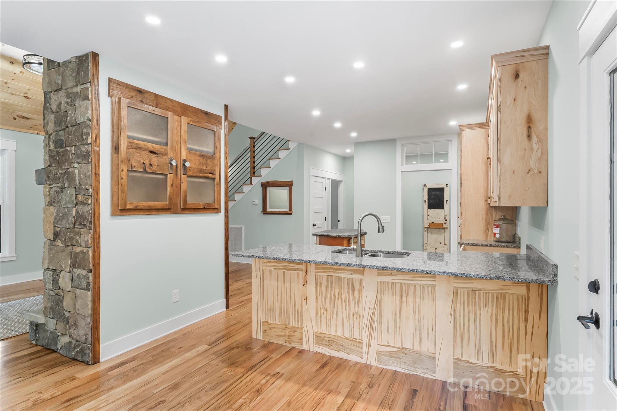 5251 Mt Olive Church Road Morganton, NC 28655 - Photo 7 of 43 a kitchen with stainless steel appliances granite countertop a refrigerator and a sink
