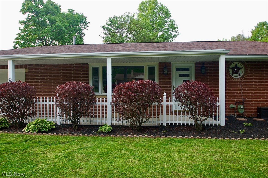 75 Kenridge Road Akron, OH 44333 - Photo 3 of 19 The covered front porch makes for a welcoming entry...