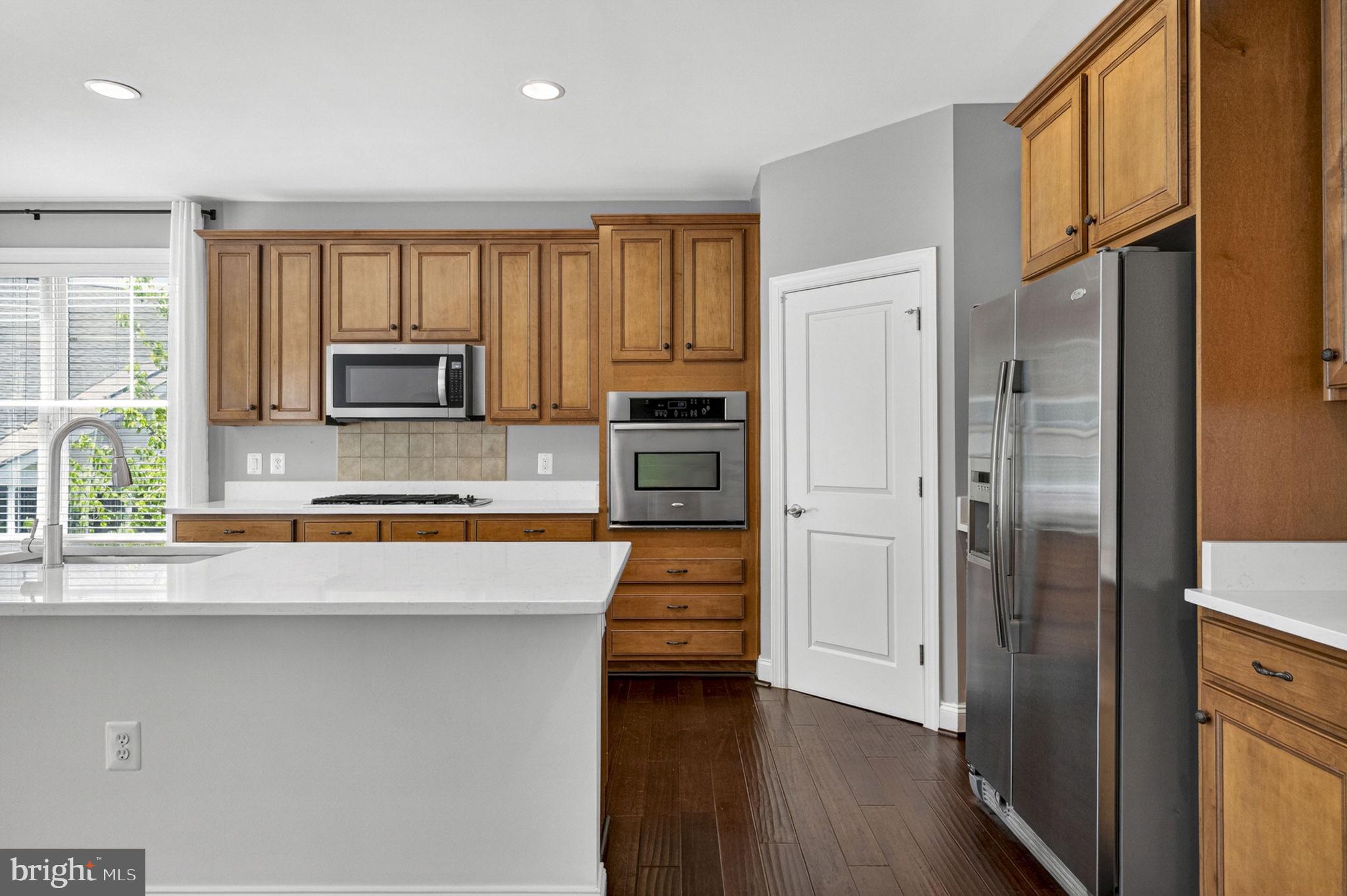 109 Tutelo Lane White Post, VA 22663 - Photo 11 of 54 a kitchen with stainless steel appliances a refrigerator sink and microwave