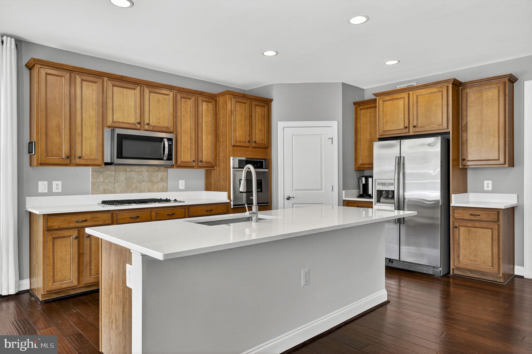 109 Tutelo Lane White Post, VA 22663 - Photo 13 of 54 a kitchen with stainless steel appliances granite countertop a stove a sink and a refrigerator