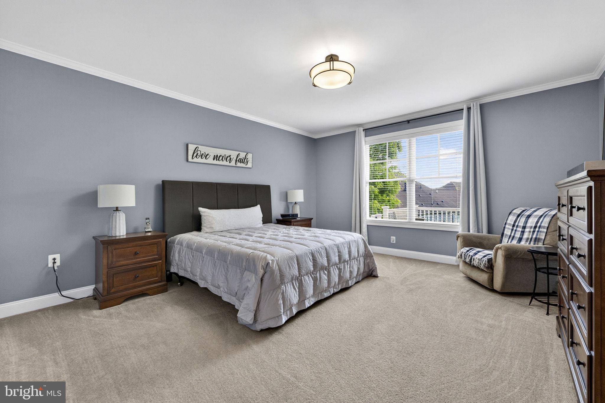 109 Tutelo Lane White Post, VA 22663 - Photo 23 of 54 a spacious bedroom with a bed and a window