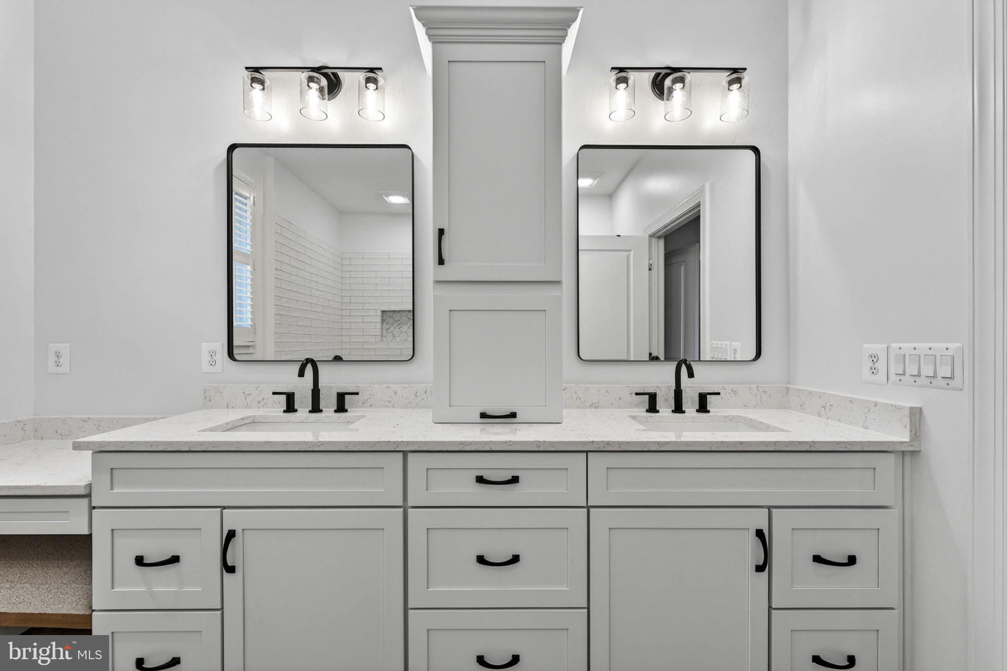 109 Tutelo Lane White Post, VA 22663 - Photo 29 of 54 a bathroom with double vanity sinks and a mirror