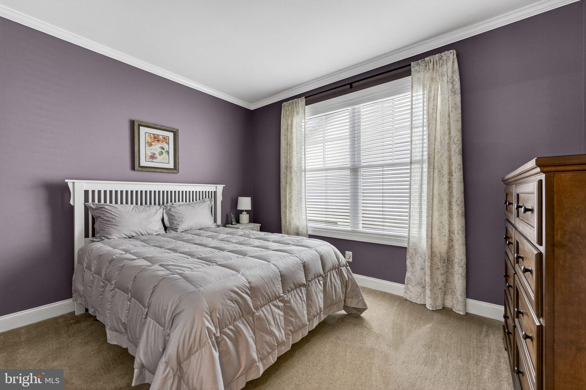 109 Tutelo Lane White Post, VA 22663 - Photo 32 of 54 a spacious bedroom with a bed and a window